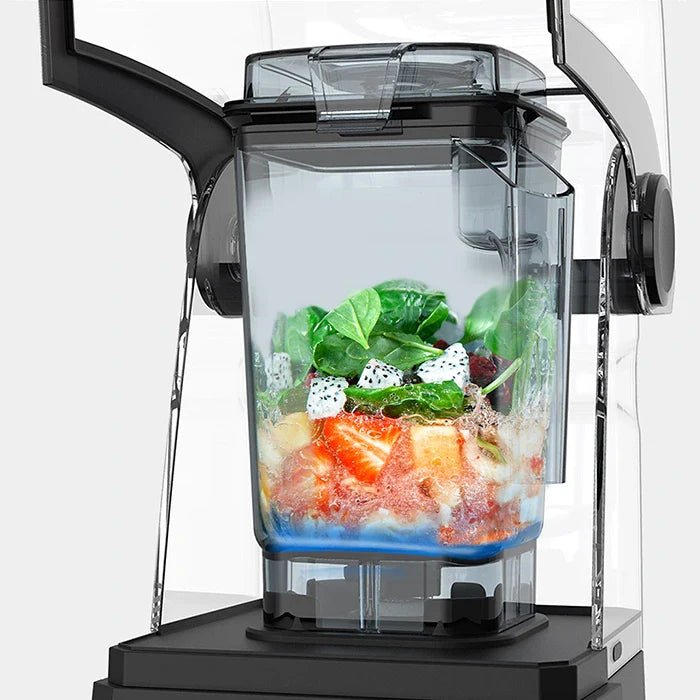 Kuvings CB850 container loaded with spinach, dragon fruit, mango and ice