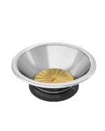 The Zumex Multifruit titanium shredding disc seated in its stainless steel filter basket