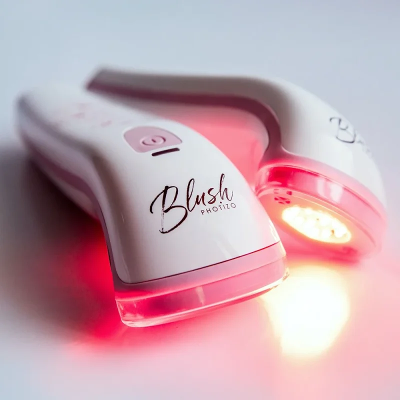 Photizo Blush – hero Photizo Blush LED light therapy device glowing red