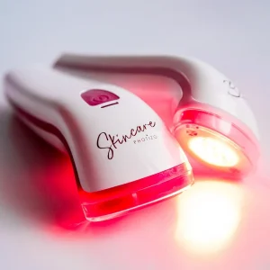 Photizo Skincare LED light therapy device glowing red