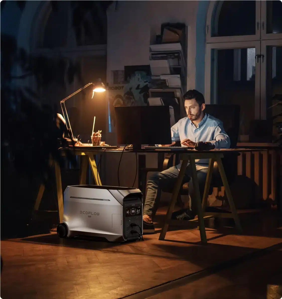EcoFlow DELTA Pro 3 powering a desk lamp and laptop during a power cut