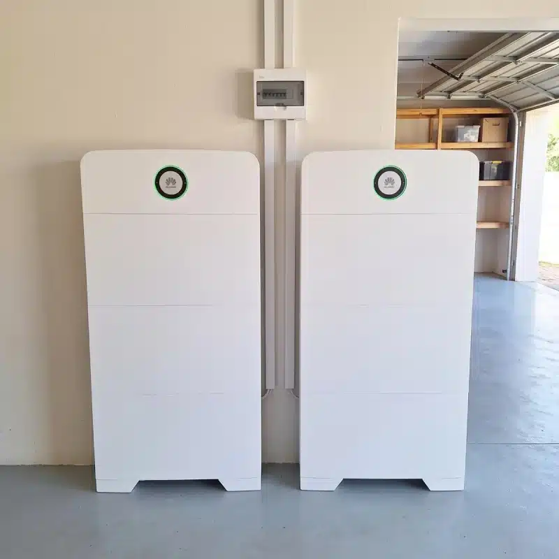 Two Huawei Power-M 15kWh units installed in a garage, 10kW and 30kWh in total